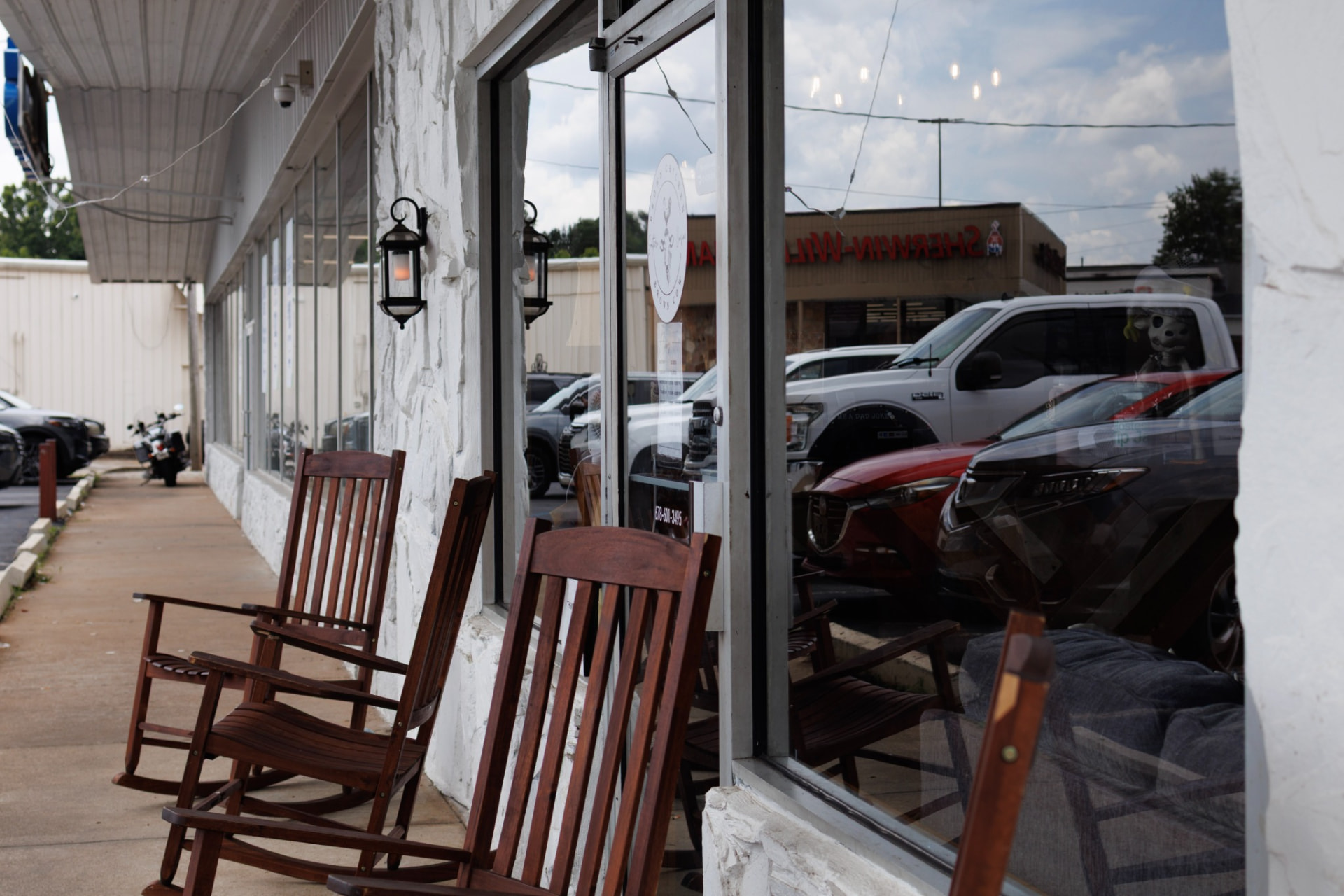 Rocking chairs on the front porch of Brown Chicken Brown Cow, Carrollton GA